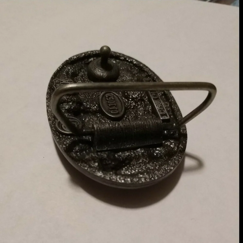 PARAMEDIC PEWTER BELT BUCKLE GREEN BACKGROUND 1986 USA